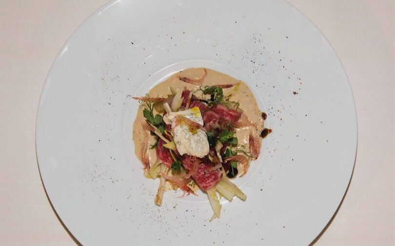 Carpaccio of wagyu beef, cream of sweet gorgonzola and sakura shrimps - Gorgonzola DOP