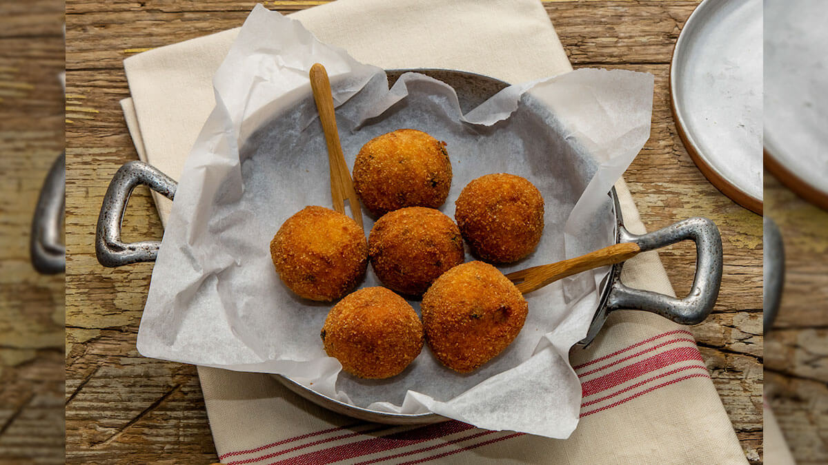 Bread meatballs with fried herbs and a heart of spicy Gorgonzola PDO - Gorgonzola DOP