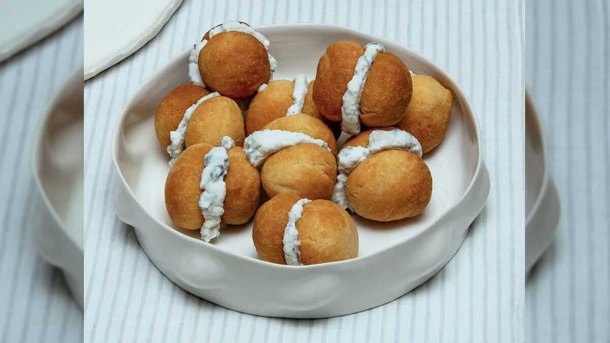 Savoury baci di dama (lady’s kisses) filled with cheese and spicy gorgonzola cream - Gorgonzola DOP