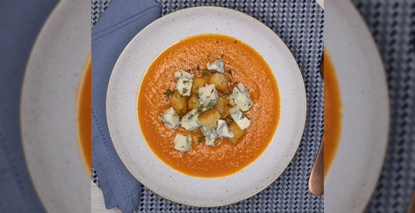 Pureed soup or leftovers with spicy Gorgonzola, croutons and herbs - Gorgonzola DOP