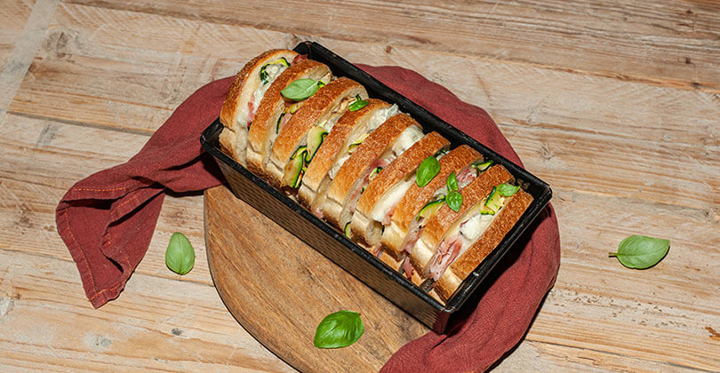 Plum cake made with sandwich bread stuffed with Gorgonzola PDO, cooked ham and grilled courgettes - 