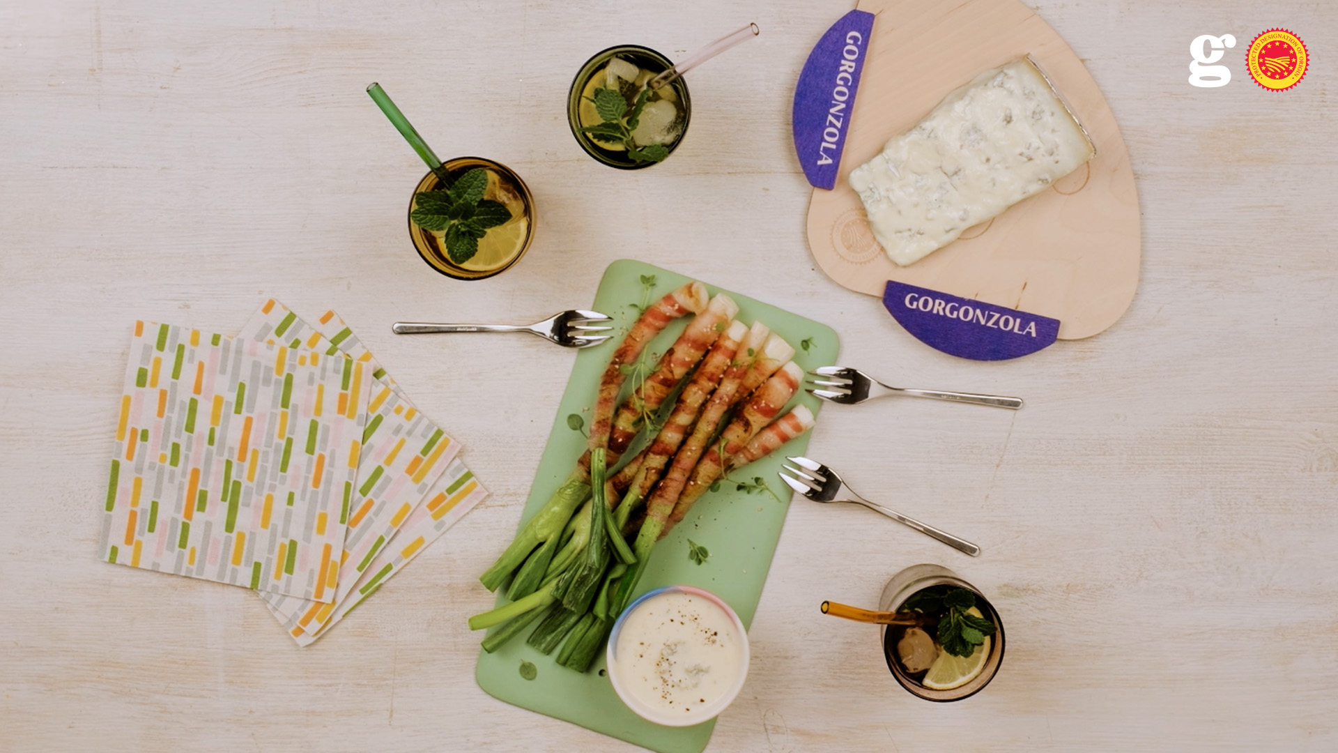 SPRING ONIONS WITH BACON, GORGONZOLA PDO SAUCE, AND SESAME - Gorgonzola DOP